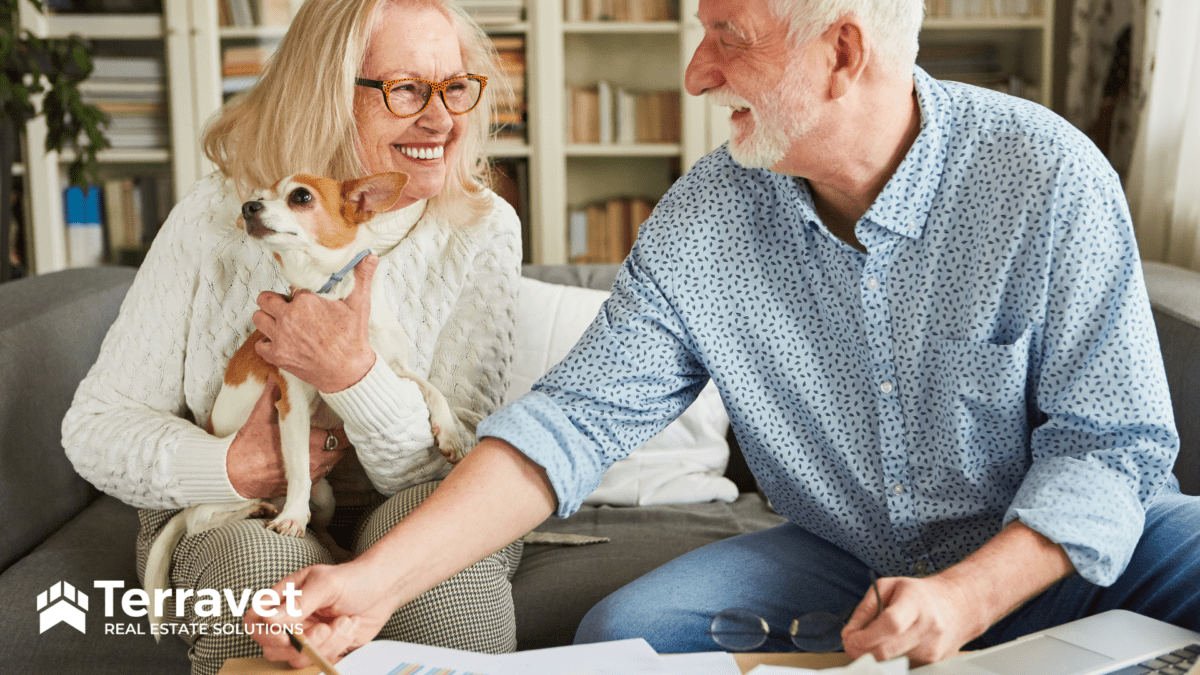 A man and woman stepping into retirement with their dog.